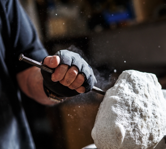 Doctor Govostes working on a masonry project